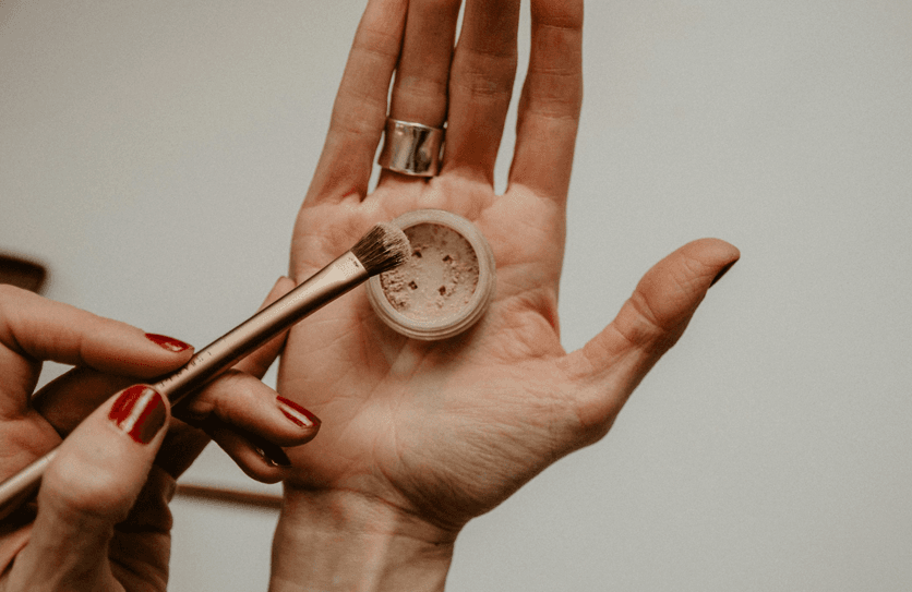 Hands holding product and pencil