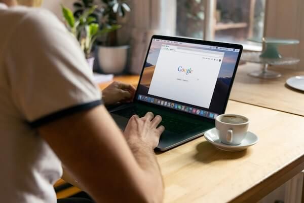 Man sitting in front of laptop